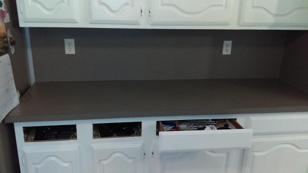 Before: Vinyl backsplash and countertops