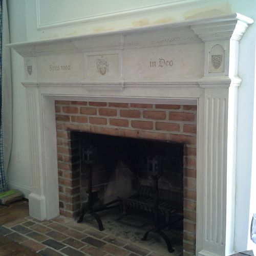 A wooden mantel turned into stone look with plaste