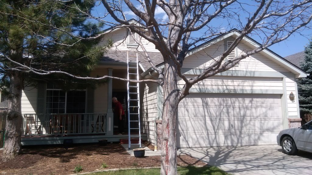 Tore down old rotted deck and repainted entire hou