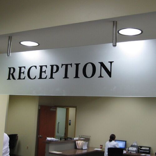 Etched and back painted reception sign