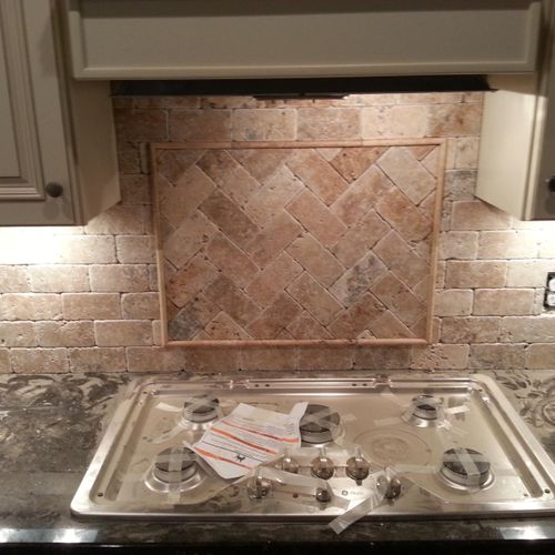 A backsplash and some under cab lighting . This on