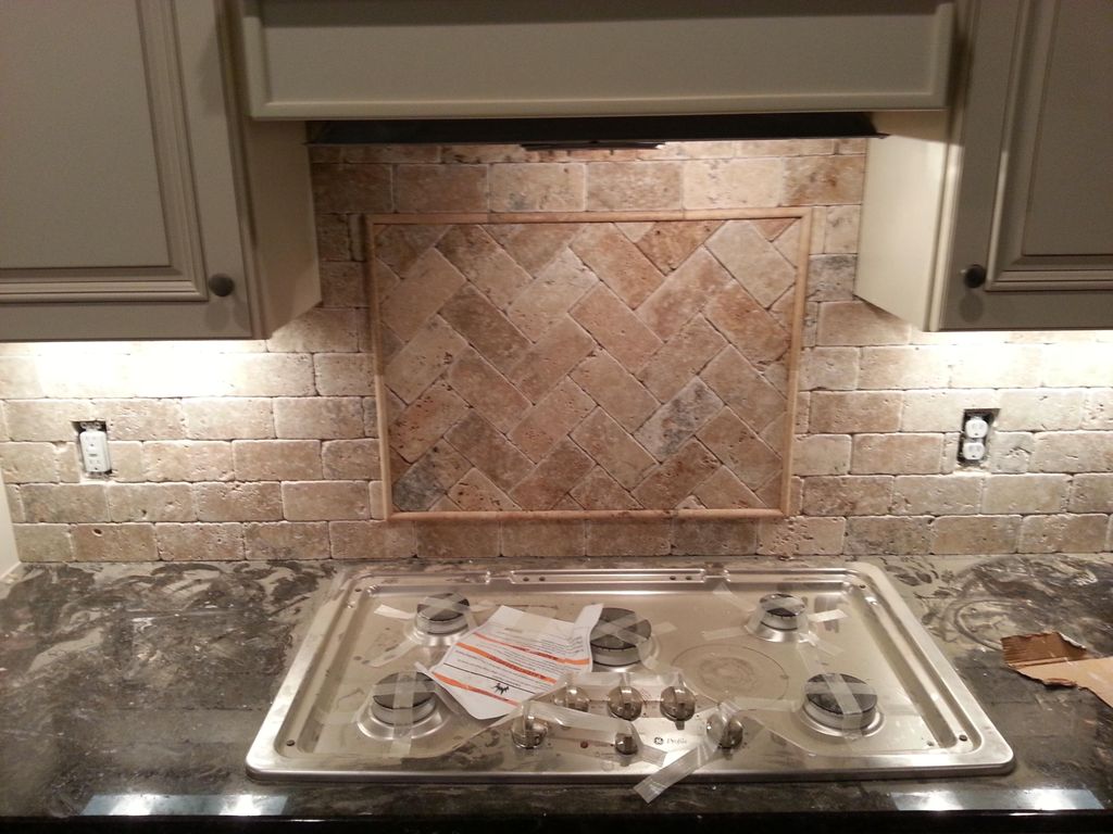 A backsplash and some under cab lighting . This on