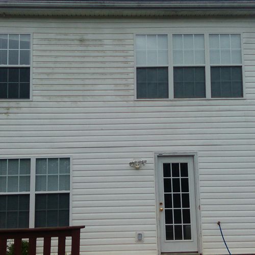 Before picture of a house we pressure washed, they
