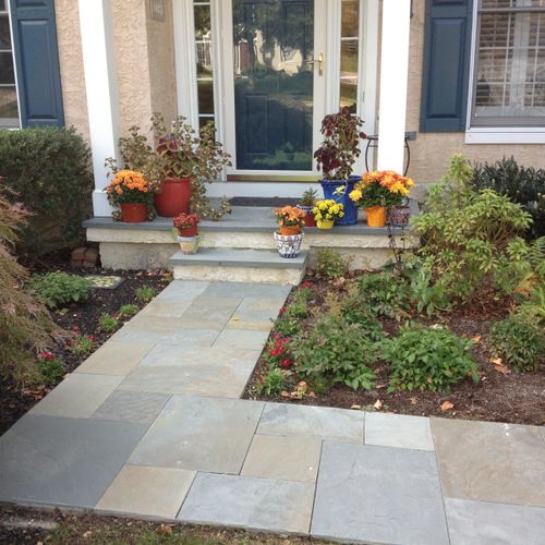 This closed joint flagstone walkway and porch is i
