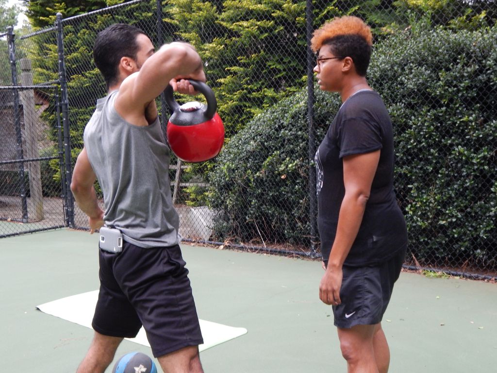 Demonstrating an exercise.