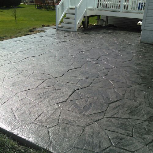 This stamped colored concrete patio was done in th