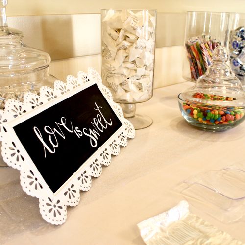 Candy bar with signage made by Aryn