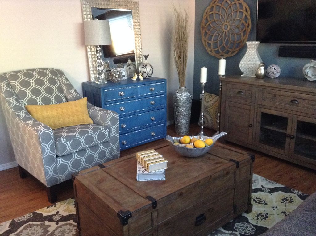 Family Room After - Combining rustic pieces with s