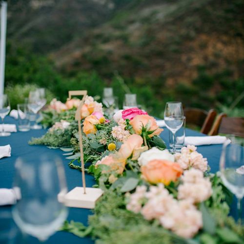 Table garlands at Liz and George's Malibu wedding.