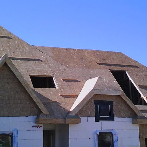 This Roof was a 12/12, with dormers, dutch hips, a