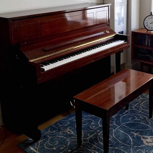Steinway piano to be moved.