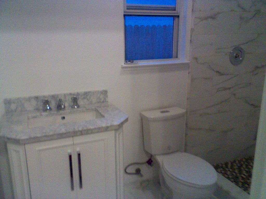 Complete bathroom remodel, marble countertop, tile