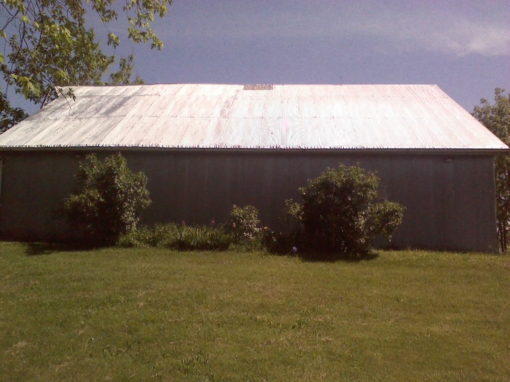Was an incredibly rusty metal barn roof with loose