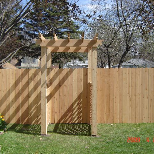 Cedar Fence With Arbor