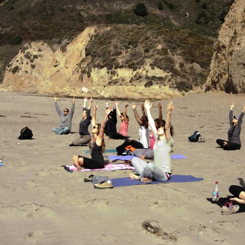 Feeling the breeze on the beach during a yoga sess