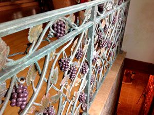 Custom wrought iron handrail with patina grapes fo