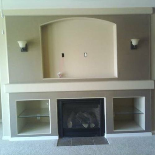 Completed Fireplace Wall, Paint, Trim, Detailing.
