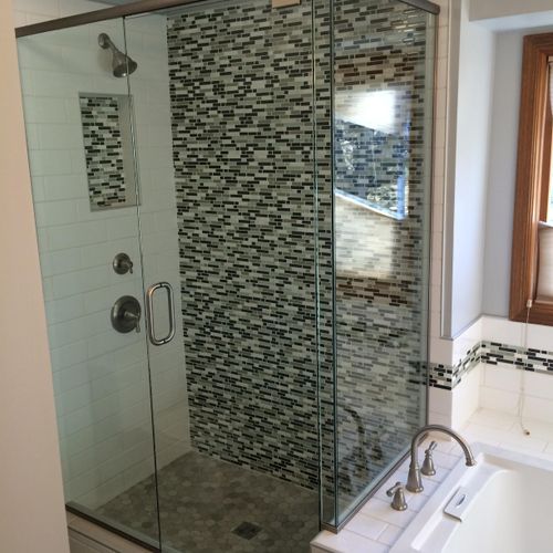 Custom shower with glass enclosure