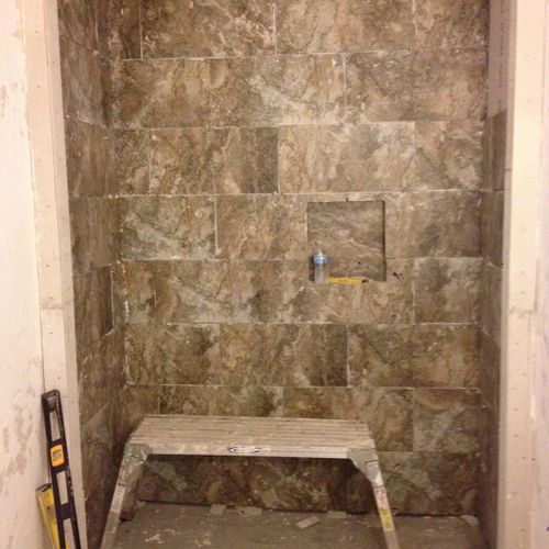 custom built showers and mancaves with benches and