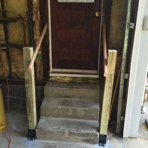 installed handrail set and mounted to cement floor