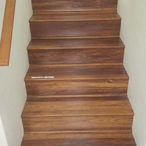 now the stairs have nice wood flooring ...