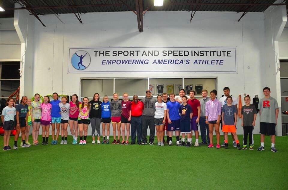 Speaking to a group at the Spot and Speed Institut