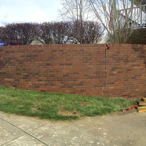 Retaining wall after cleaning, before repair.