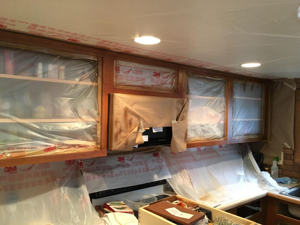 Kitchen masked and toned from a golden oak to a da