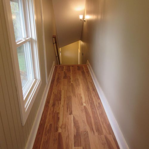 After (Hallway Laminate Flooring/ Trim)