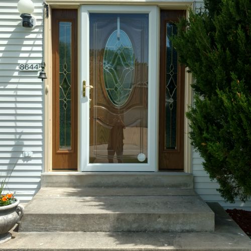 Installed main entry door with sidelights