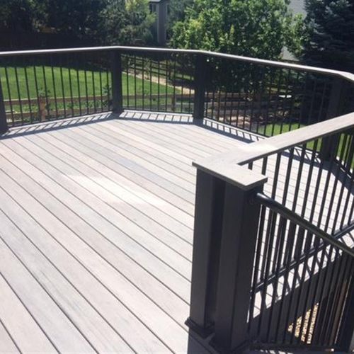 upper-level composite deck with iron railing