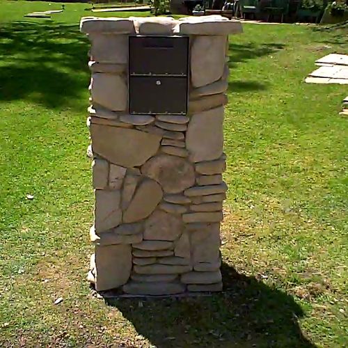 Custom stone mailbox.