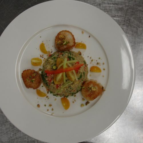 Pan Seared Scallops served with Kale and Quinoa Sa