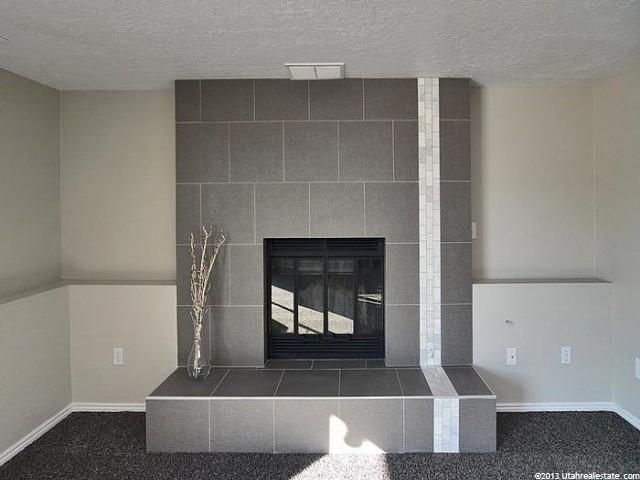 Old brick fireplace before...Modern living room ac