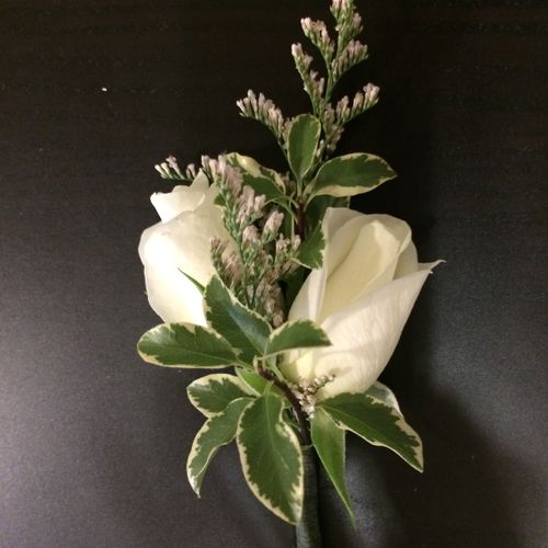 Classic white spray rose boutonnieres