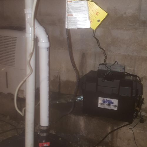added a battery backup sump pump in a crawlspace
