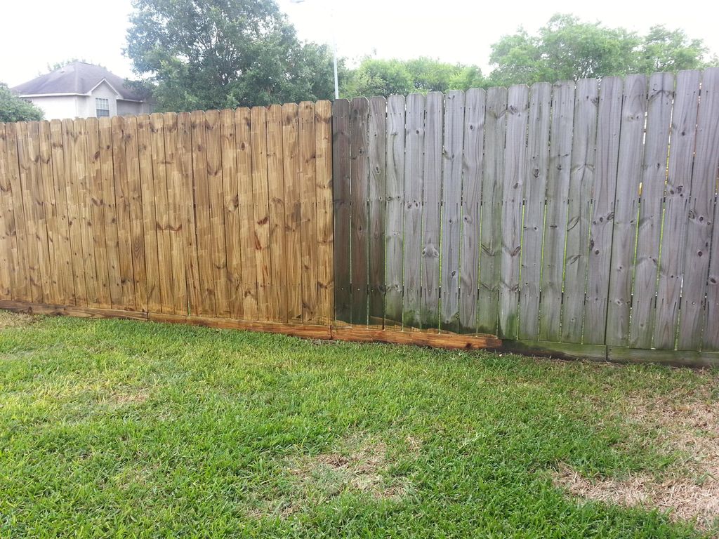 Pressure washing fence