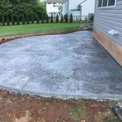 Stamped concrete flows well with a curved edge