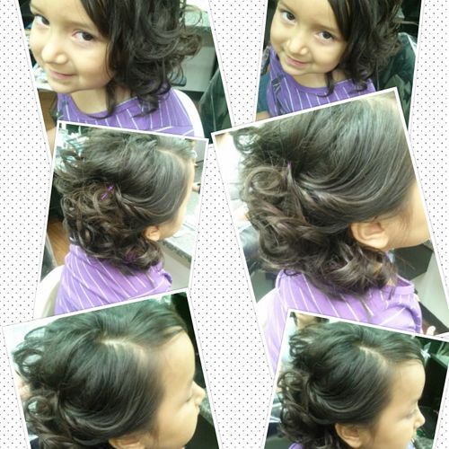 side swept curled hair do.