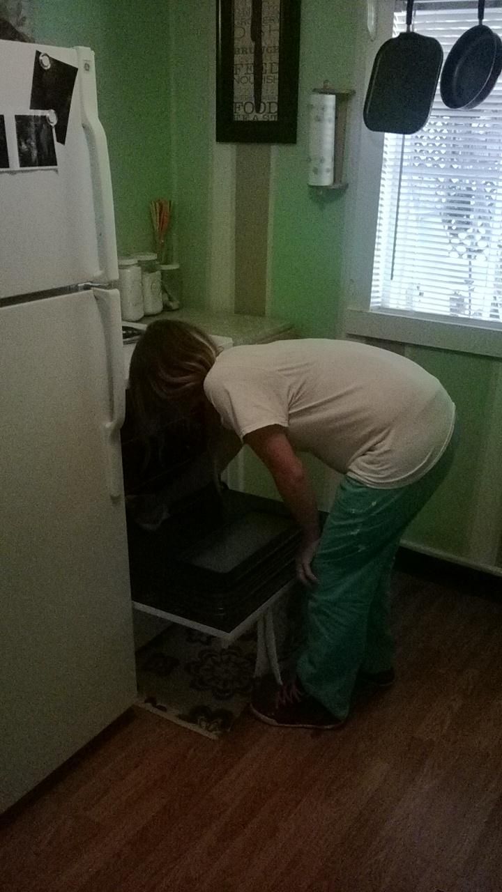 Amanda cleaning a weekly customers house.