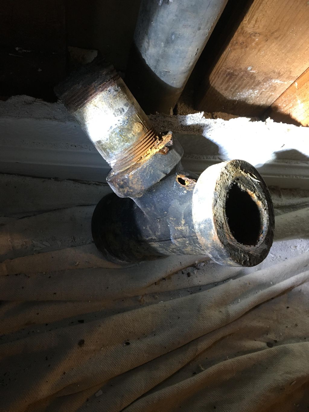 Cast iron tee. (Before)