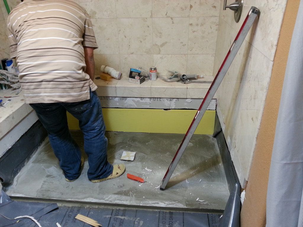Before - Removed plastic shower pan it was leaking