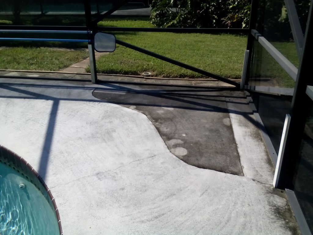 Pool deck pressure wash with corner still dirty to