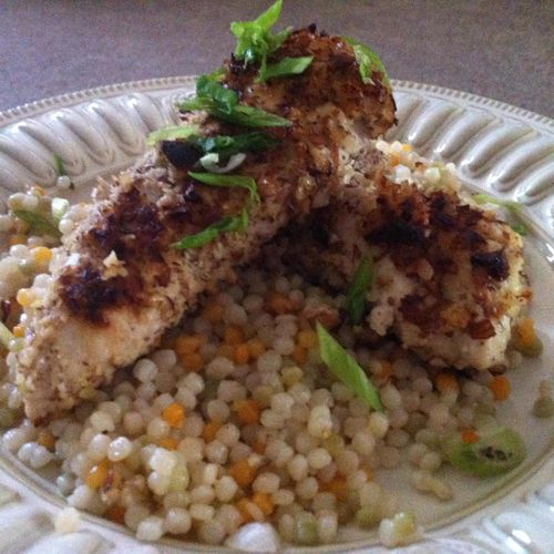 Baked Chicken crusted in almonds with Couscous