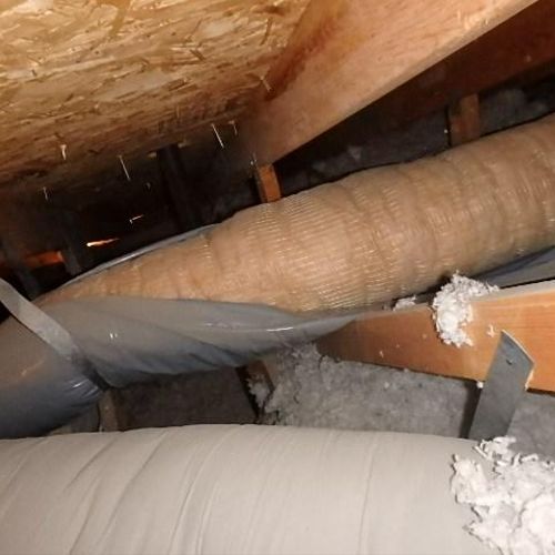 Faulty duct work up in the attic at a Home Inspect