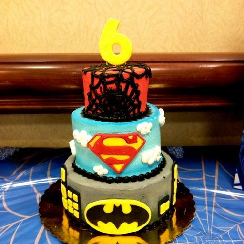 Super Hero Cake.  We offer custom designed cakes t