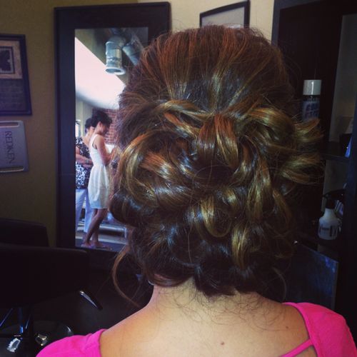 Bride wearing a low wedding up do