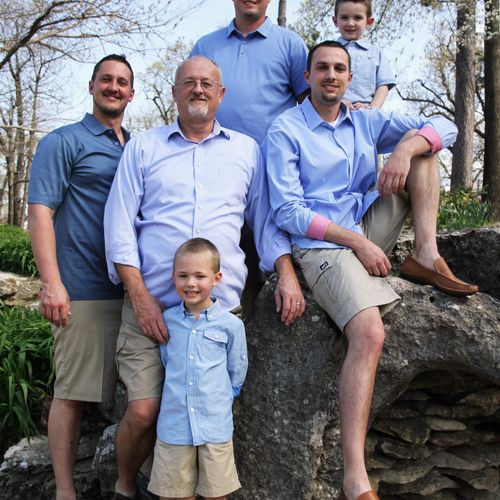 Family Portraits. The men of the family stand toge