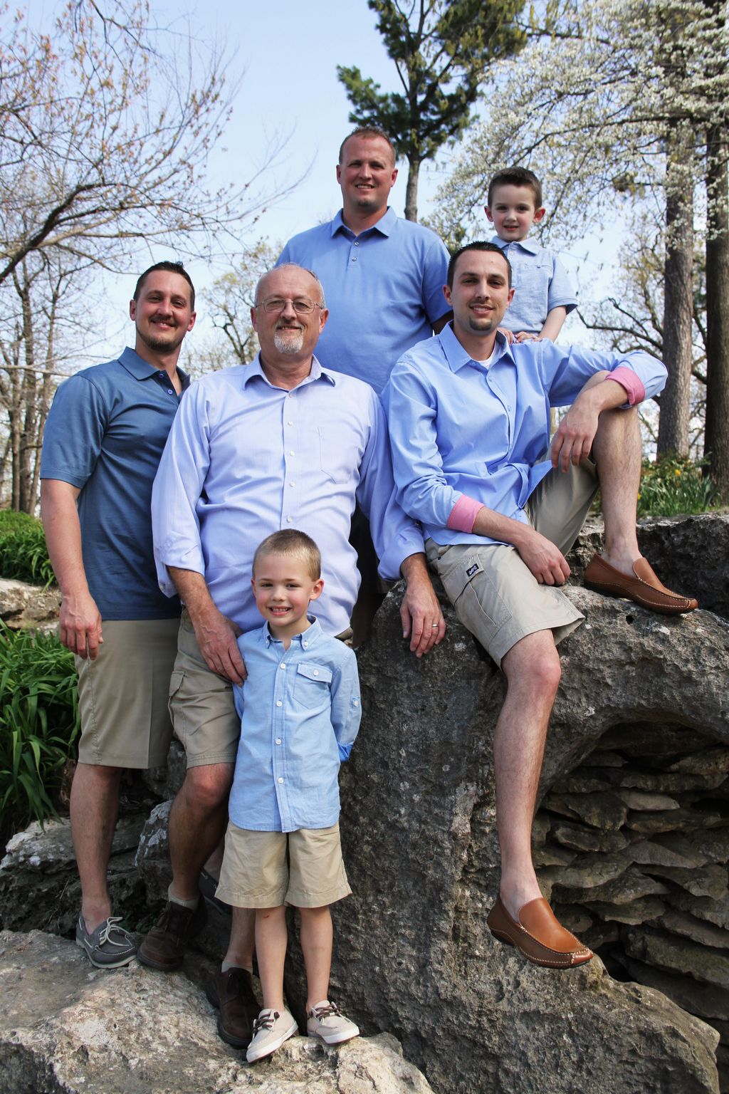 Family Portraits. The men of the family stand toge