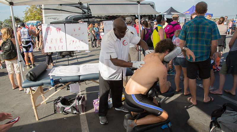 Working on an athlete at O C Tri Event 2015